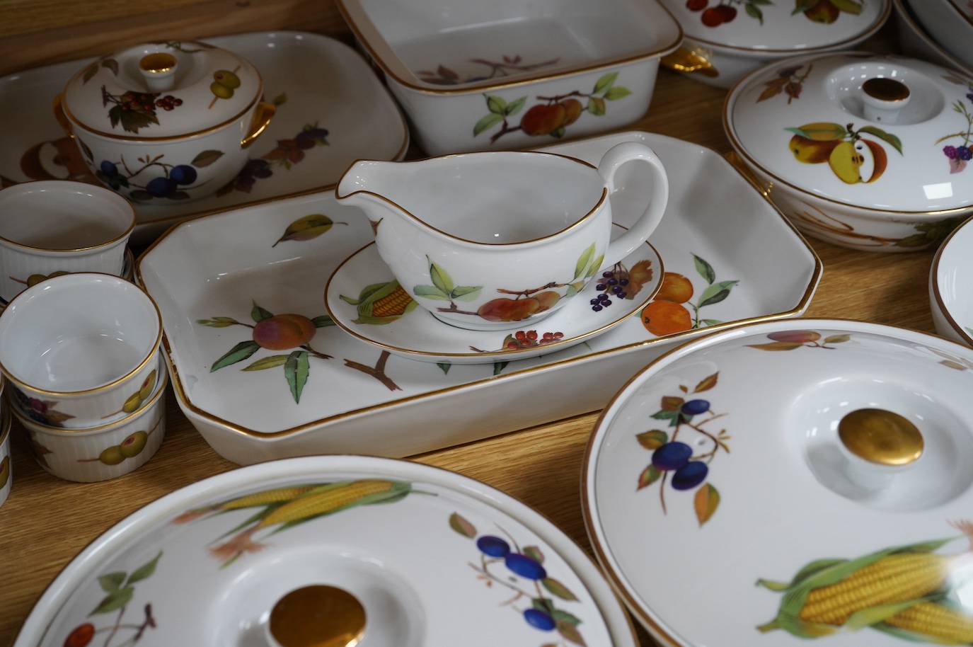 A collection of Royal Worcester Evesham dinnerware to include tureens, dishes and a sauce boat, largest 32cm wide. Condition - fair